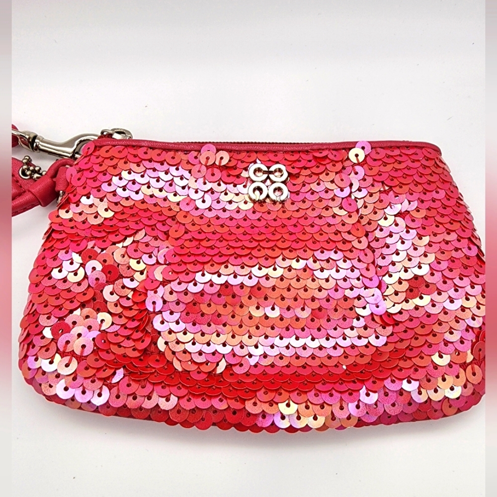 Coach pretty pink sequin wristlet like new!
